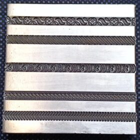 BW32 bangle wire die with scroll and chevron pattern grooves